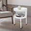 Table ronde avec rangement ouvert pouvant servir de table de chevet
