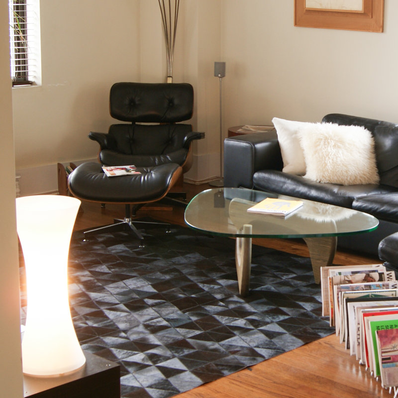 Bhavin Geometric Tufted Faux Sheepskin Black Area Rug