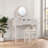 Elegant Makeup Vanity Table With Reversible Four-leaf Shaped Mirror, 5 Drawers, Golden Round Handles And A Stool