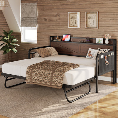 Lit de jour simple avec lit gigogne et tête de chargement, conception peu encombrante pour les appartements