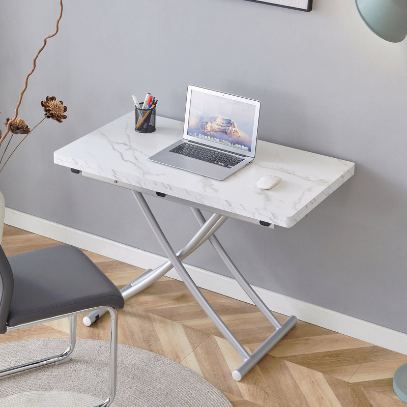 La table élévatrice multifonctionnelle moderne et minimaliste avec un bureau en panneau de fibres à densité moyenne de 0,8 pouce d'épaisseur et des pieds en métal argenté peut être utilisée comme coiffeuse, table basse, table de salle à manger et table de bureau. W1151126194