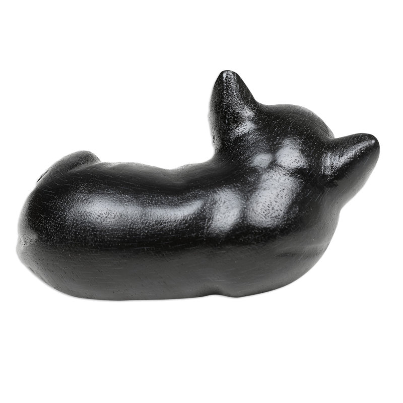 Sculpture de chihuahua endormi dans la nuit