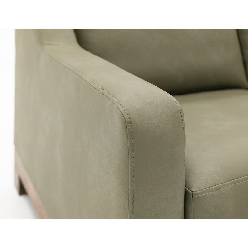 Fauteuil avec base en bois exposée