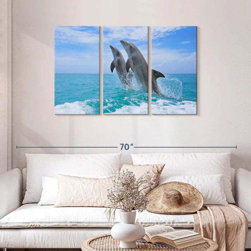 Bramph dauphins jouant en mer, H 28 po x l 45 po