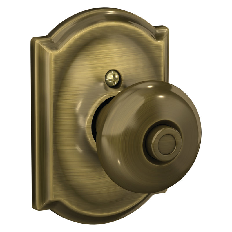 Plymouth Knob with Camelot Trim Bed and Bath Lock, Antique Brass