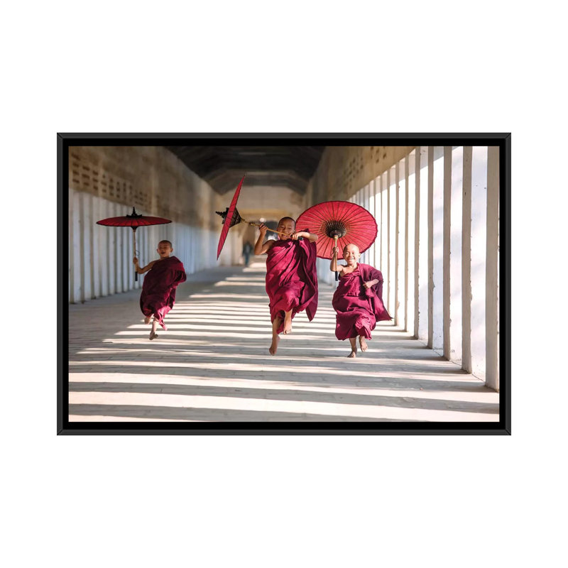 " Three Monks Running, Burma " by Matteo Colombo, 18" H x 26" W x 1.5" D, Black Floater Framed Canvas, No Mat