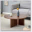 Table basse polyvalente ronde en panneau de fibres à densité moyenne au fini noyer pour divers styles d'intérieur, alliant le minimalisme moderne à l'élégance nordique, avec des dimensions de 31,5 x 31,5 x 13,98 pouces.