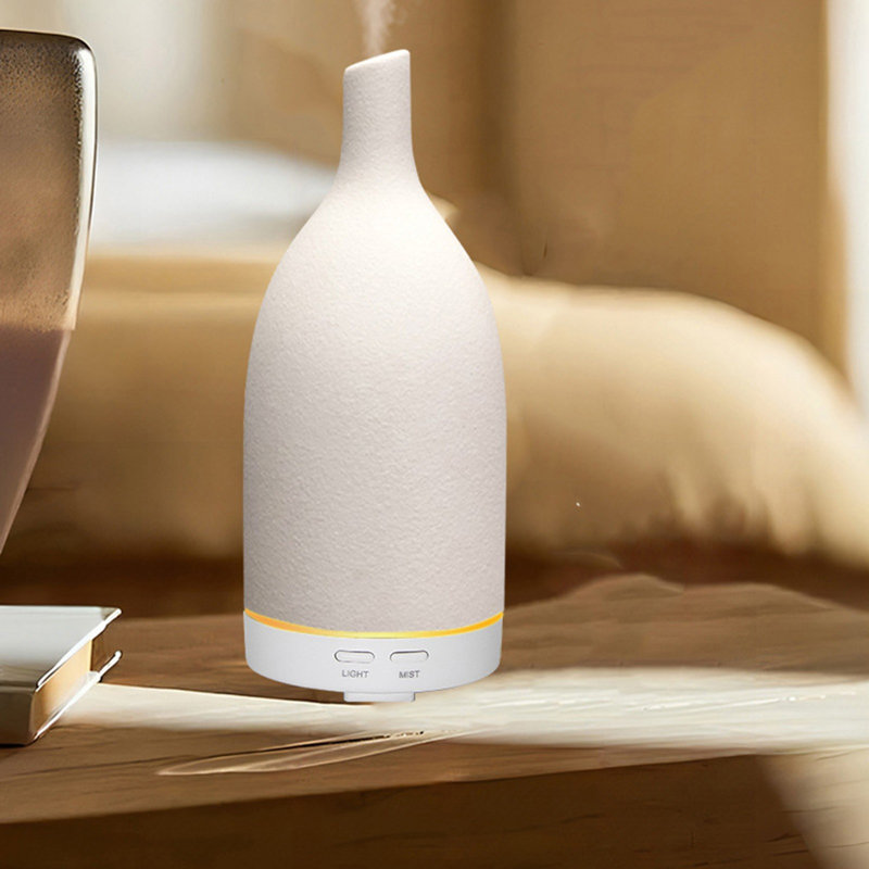 Élégant diffuseur d'arôme en céramique pour la maison et le bureau avec brume fine, performance silencieuse et mode de pulvérisation