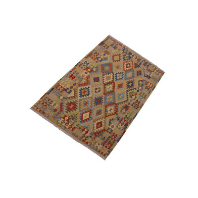 Madee Geometric Handmade Rectangle 4'8" x 6'8" Wool Area Rug in Brown/Orange