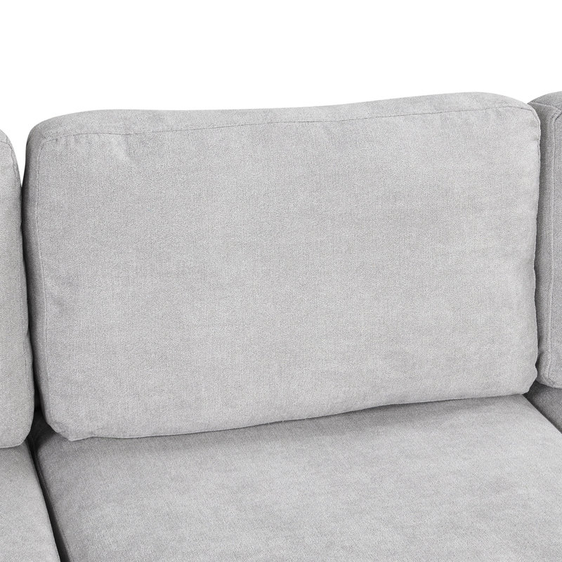 Canapé courbé 3 places, revêtement en chenille gris, ergonomique, pieds en métal, coussins amovibles, atmosphère douillette