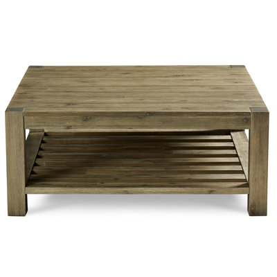 Ermenek Solid Wood 4 Legs Coffee Table with Storage by Loon Peak