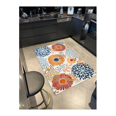 Tapis tissé à motif floral moderne dans des tons de couleurs mélangées, lavable