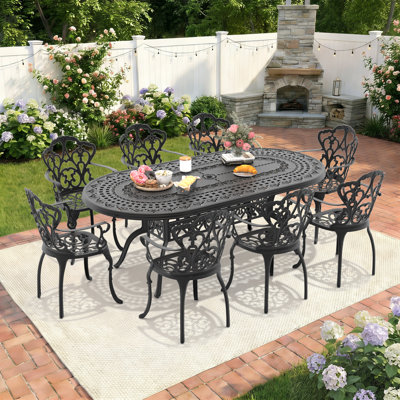 Ensemble de salle à manger de patio 9 pièces, table ovale de 81,89 po avec trou pour parasol et 8 fauteuils avec coussins beiges