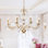 Lustre à bougie rétro 8 lumières à intensité variable avec accents en cristal Jonetta