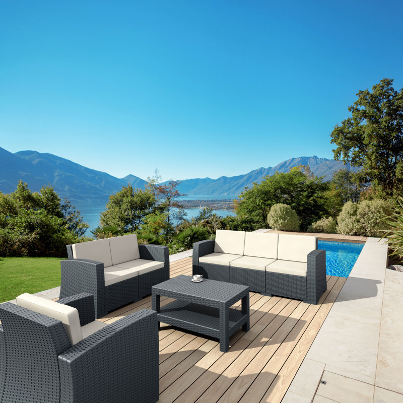 Chaise de patio avec coussins Mcchesney, Gris foncé