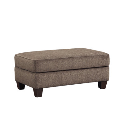 Repose-pieds confortable en tissu pour la détente et le divertissement, rehaussant votre espace de vie.