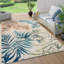 Tapis intérieur / extérieur à motif floral orange / ivoire / bleu Onley Palm Frond-69986561