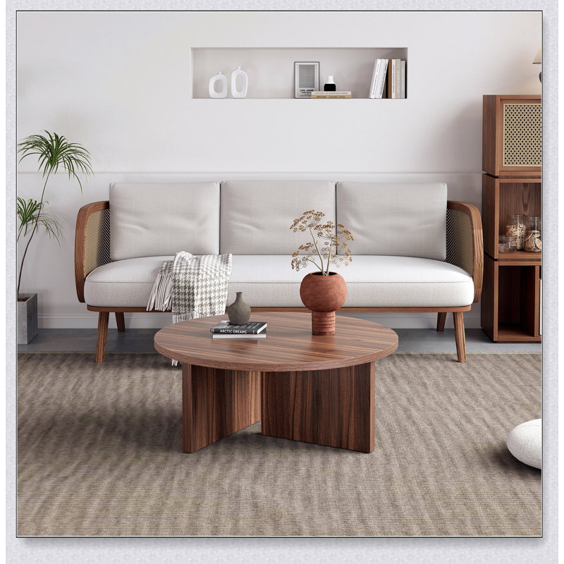 Table basse polyvalente ronde en panneau de fibres à densité moyenne au fini noyer pour divers styles d'intérieur, alliant le minimalisme moderne à l'élégance nordique, avec des dimensions de 31,5 x 31,5 x 13,98 pouces.