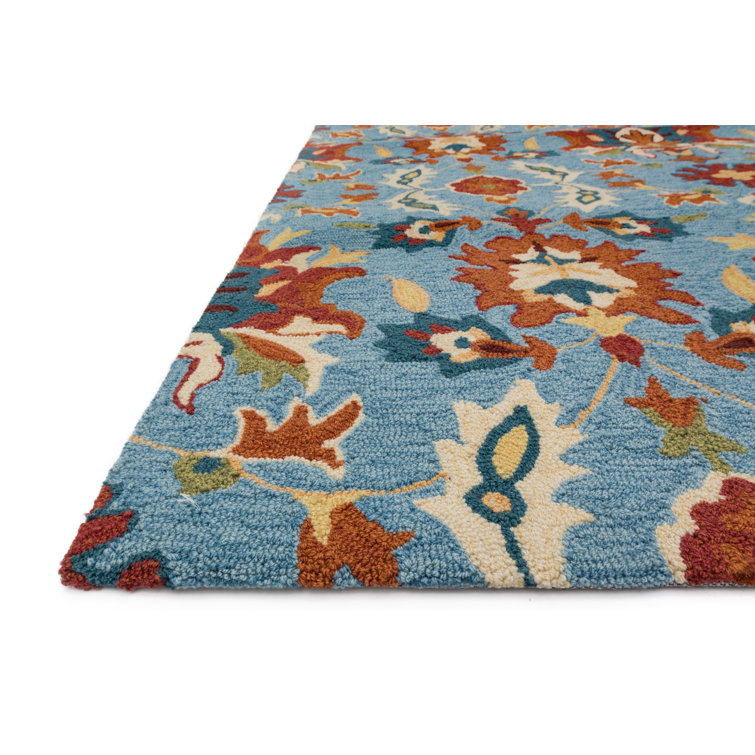 Tapis décoratif bleu/rouge crochetée à la main à motif géométrique Wainwright