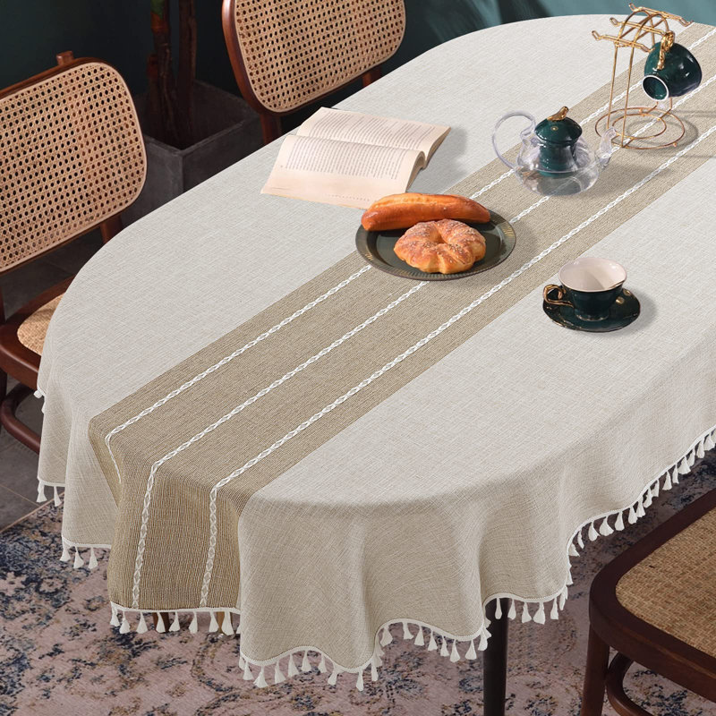 Nappe unie à broderie unie avec pampilles pour table ovale, housse de table en dentelle résistante à la poussière de 60 po x 84 po pour les repas dans la cuisine, décoration de table anti-décoloration infroissable