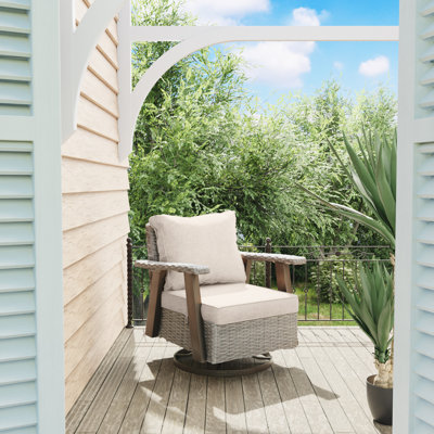 Outdoor Azalee Rocking Polyethylene (PE) Wicker Chair with Cushions by Hokku Designs