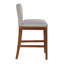 Tabouret de bar rembourré avec montants en métal et pieds en bois robustes