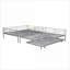 Lit superposé double au-dessus d'un lit double avec lit gigogne escamotable, structure en fer argenté robuste pour dortoir de chambre d'amis