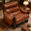 Fauteuil lounge en cuir de style milieu du siècle avec coussin amovible, idéal pour le salon, la chambre ou la salle de lecture.