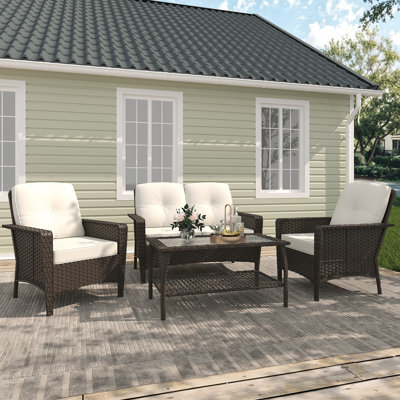 4-Piece Rattan Outdoor Sofa Seating Group with Cushions: Includes Loveseat, 2 Armchairs, and Coffee Table - Premium Patio Furniture for Backyard or Deck