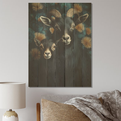 Famille de chèvre noire en fleurs - animal de chèvre sur bois