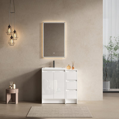 Meuble-lavabo autoportant de 36 po avec lavabo en résine et 1 armoire de rangement, portes et tiroir à fermeture en douceur, blanc brillant, contreplaqué (emballage KD)