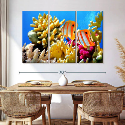 Brampt Butterflyfish And Corals