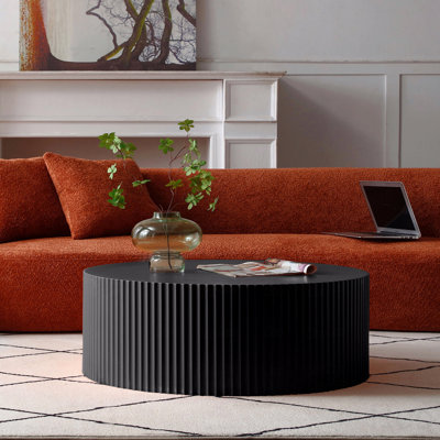Sleek Modern Round Coffee Table Eye-Catching Relief Design