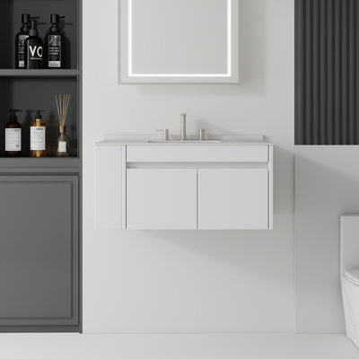 Meuble-lavabo suspendu de 91 cm (36 po) avec lavabo, porte à fermeture amortie, comptoir et dosseret en marbre reconstitué blanc granité de 1,5 cm (0,6 po), armoire en contreplaqué, fini blanc