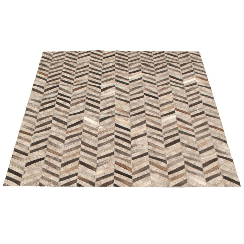 Jeraldene Cowhide Patchwork Indoor Rug