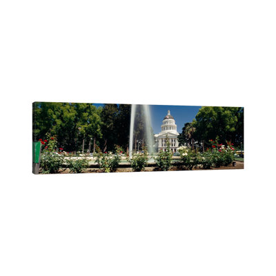 Fountain In A Garden In Front Of A State Capitol Building, Sacramento, California, USA by Panoramic Images - Wrapped Canvas Panoramic Print