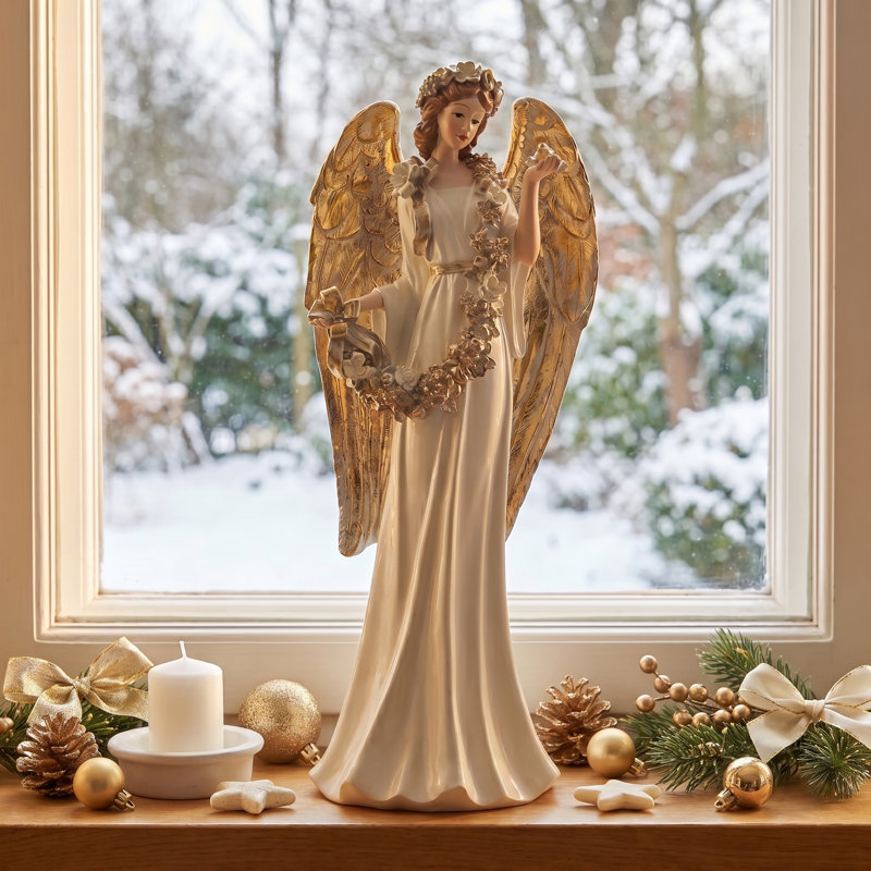24" Resin Angel With Magnolia Garland