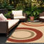 Tapis intérieur / extérieur rouge, orange, vert et beige Brynie-24491611