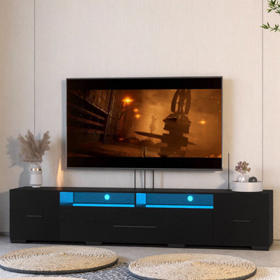 [Vidéo] Meuble télé avec armoires de rangement, télécommande, long meuble télé à DEL avec contrôle des applications, sélection complète de couleurs RVB, centre de divertissement moderne à 31 lumières changeantes avec cordon d'alimentation (noir, pour 80 pouces)