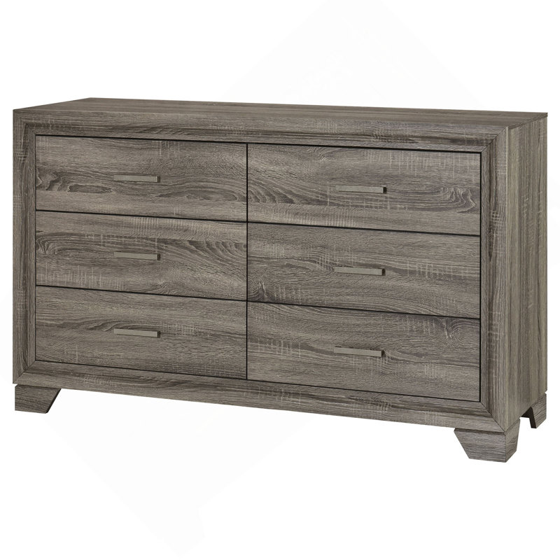 La commode et la commode avec une finition en bois rustique et des poignées subtiles combinent charme rétro et rangement spacieux pour la chambre à coucher