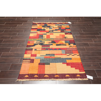 Tapis doré en laine à tissage plat fait main Starbuck