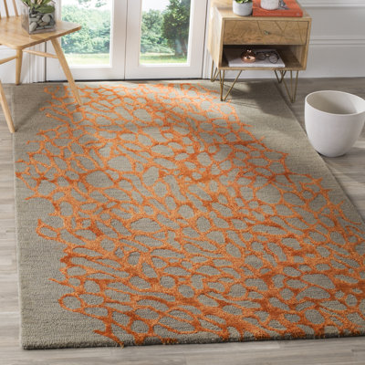 Tapis gris / orange en laine crocheté à la main Rigsby