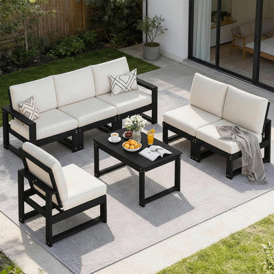 Ensemble modulaire de patio en L 7 pièces en PEHD sans entretien, canapé noir 6 places toutes saisons avec texture grain de bois et coussins moelleux pour la cour, noir