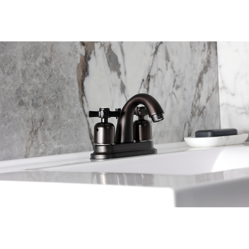 Kingston Brass Millennium Two-Handle 3-Hole Deck Mount 4" Centerset Bathroom Faucet with Plastic Pop-Up, Oil Rubbed Bronze