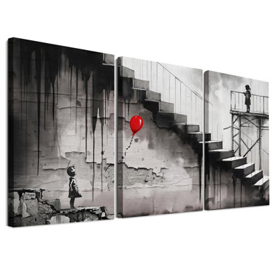 Ensemble de 3 toiles murales représentant une fille avec un ballon rouge sur un escalier noir et blanc