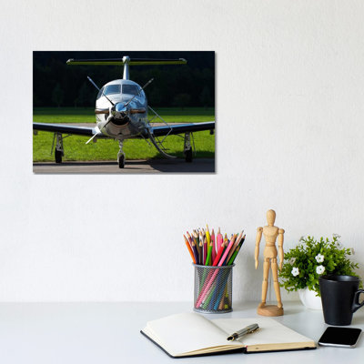 A Pilatus PC-12 Private Jet by Luca Nicolotti - Wrapped Canvas Print