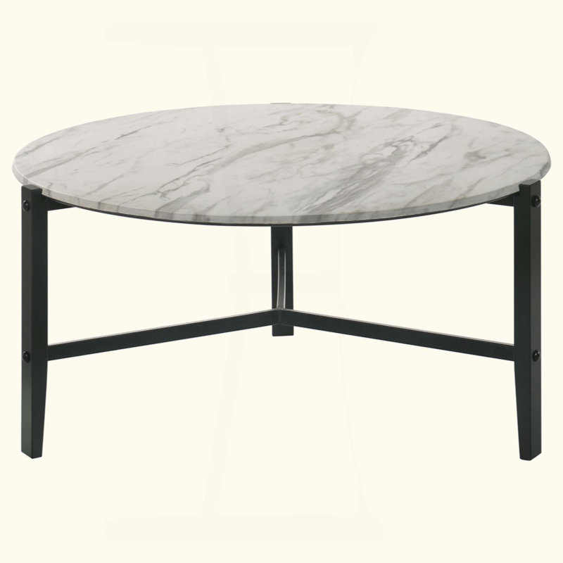 Table basse ronde blanche et noire en faux marbre