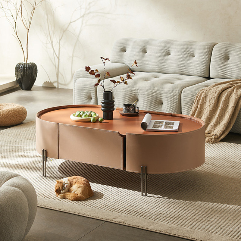 Table basse ovale en cuir selle