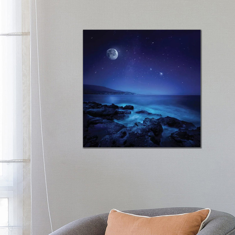 Rocks Seaside Against Rising Moon And Starry Field, Crete, Greece by Evgeny Kuklev - Wrapped Canvas Print