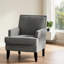 Fauteuil confortable en polyester avec garniture cloutée et 4 pieds robustes, parfait pour lire et se détendre dans n'importe quelle pièce.